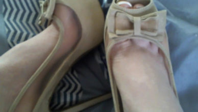 Pretty feet in peep toe shoes.